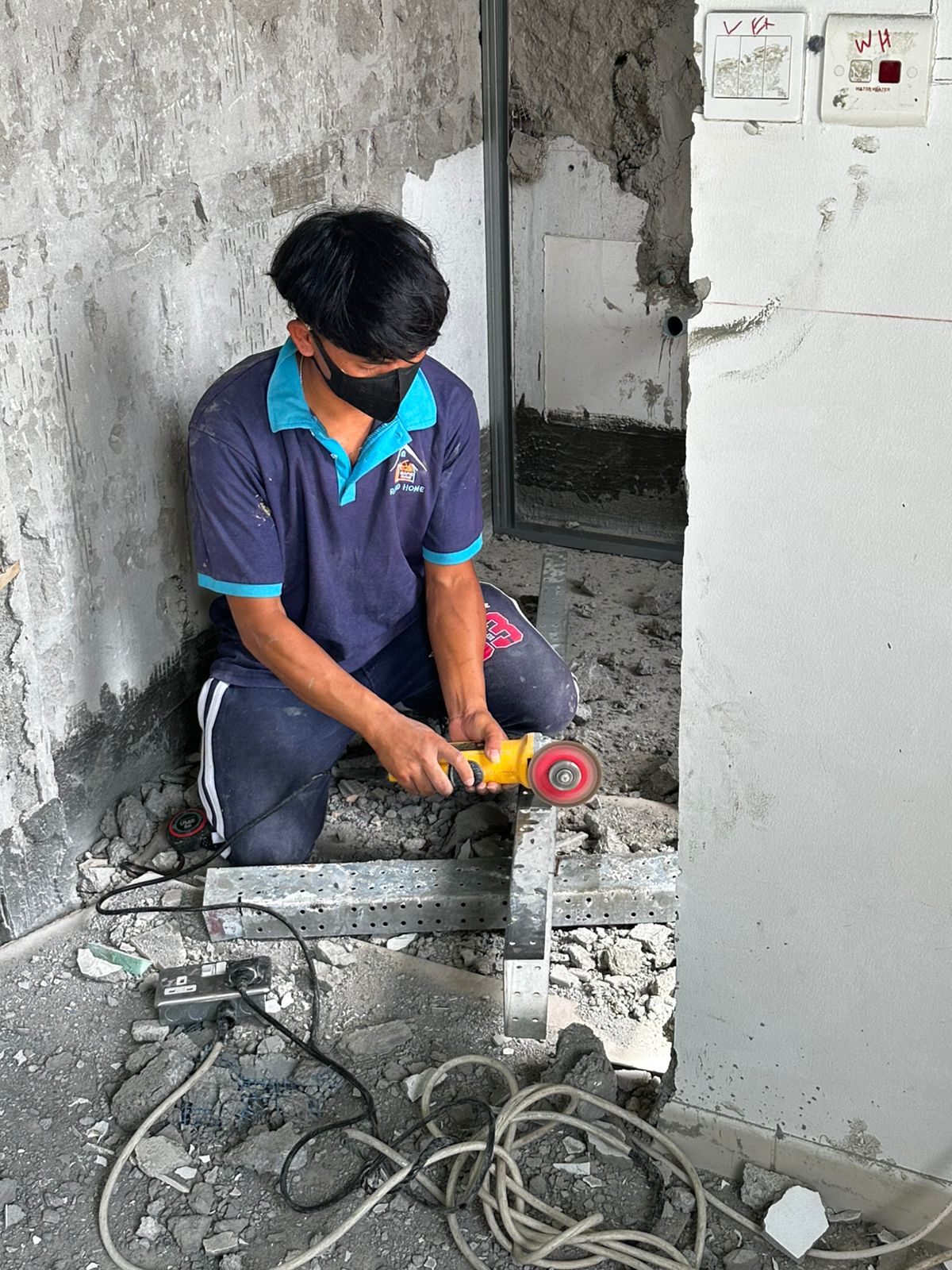 Rapid Home technician working on a property repair