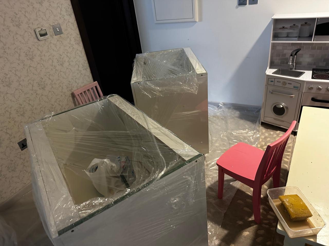 Furniture and flooring protected before maintenance work